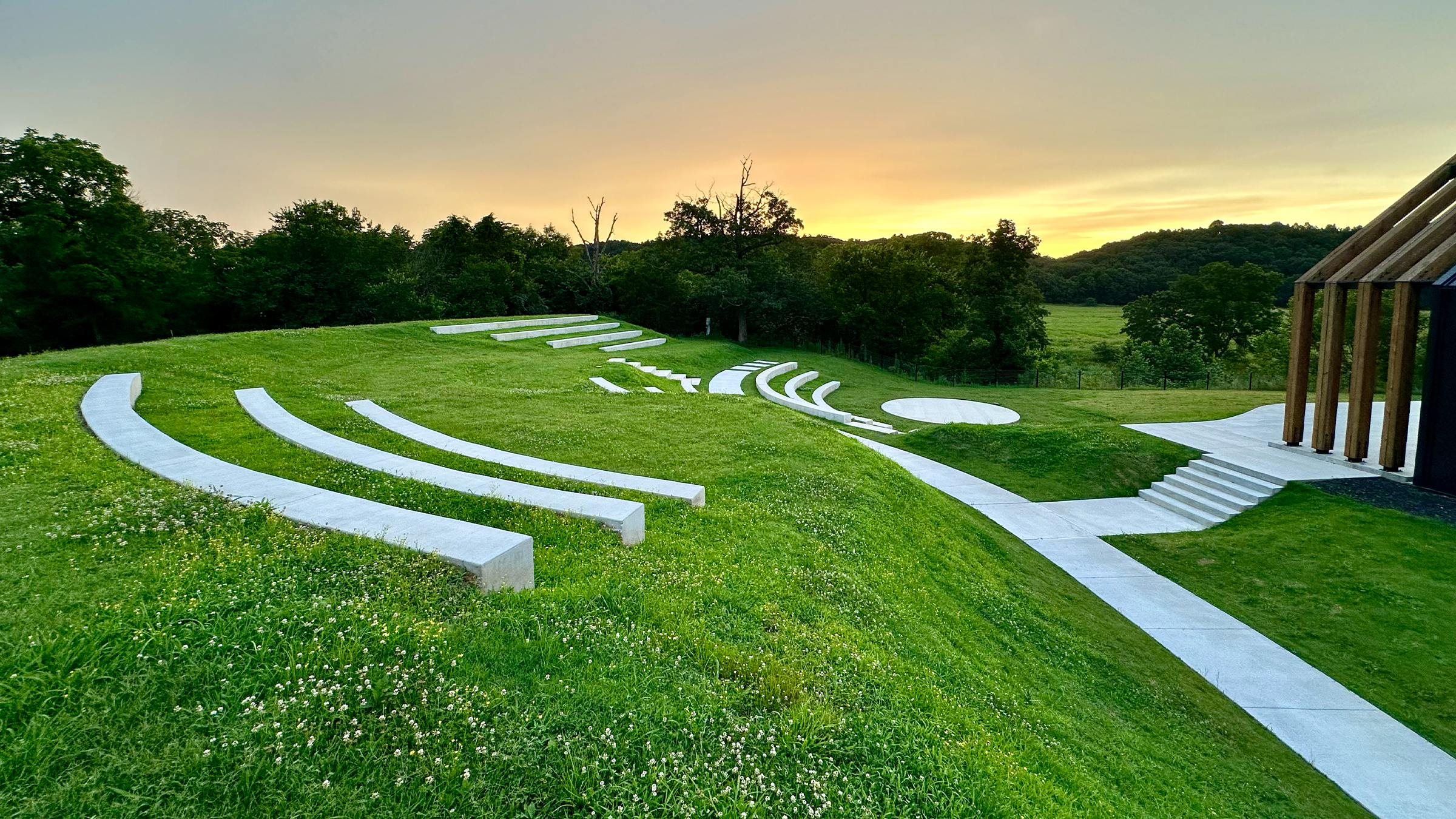 Amphitheater seating and pavilion at sunset