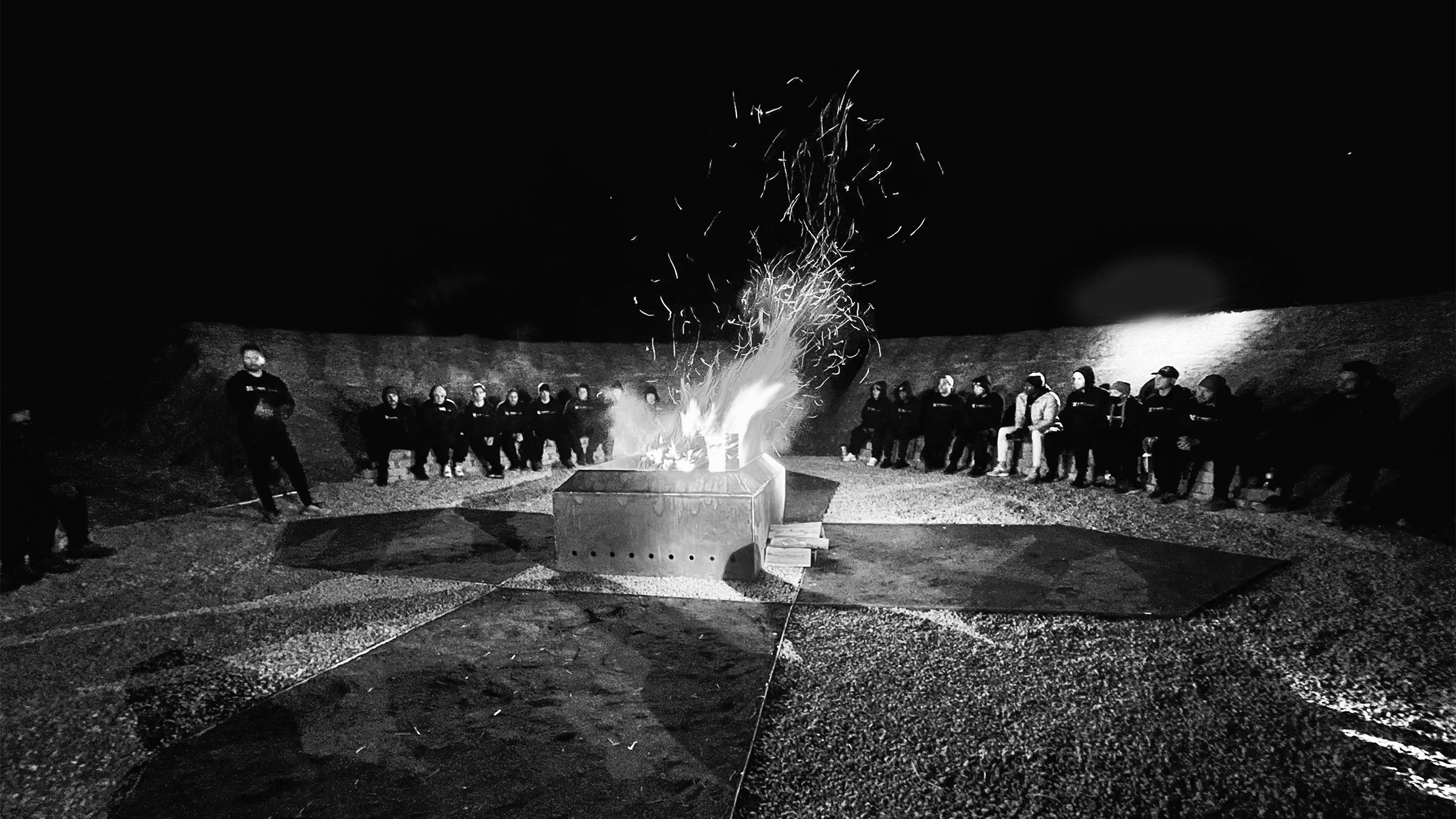 UHP class gathered around the central fire inside SPACE