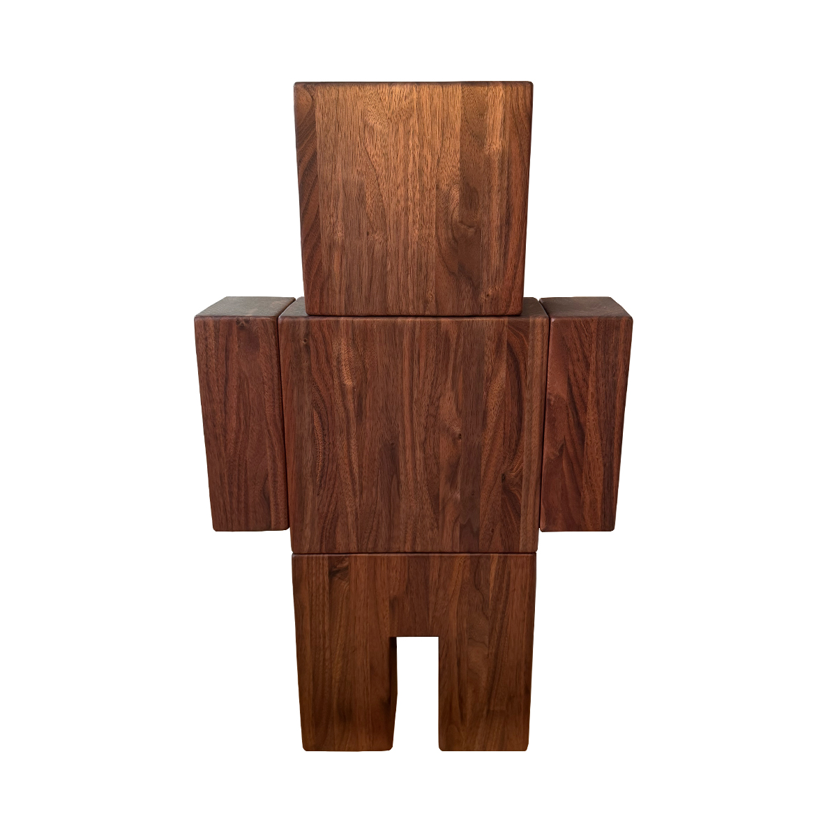 Straight-on view of the FIGURE_2 sculpture in solid walnut on a white background.